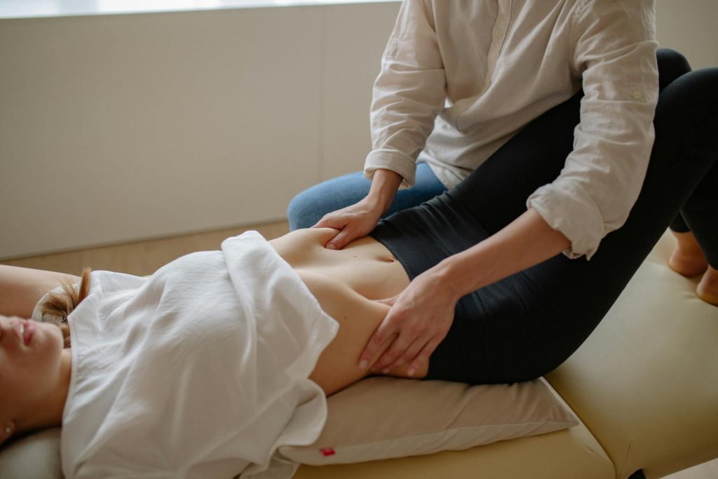 navel displacement woman lying on a table
