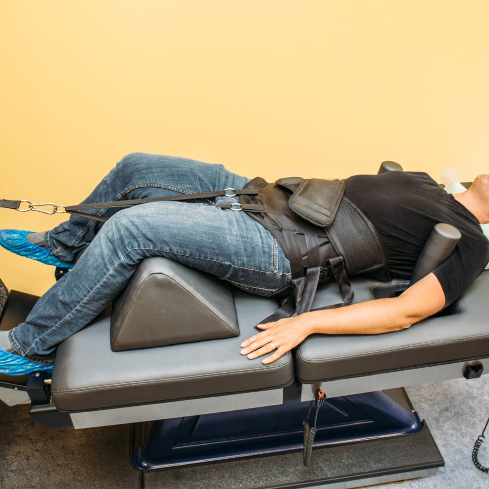 Male,Patient,At,Non-surgical,Treatment,Physiotherapy,Of,Lumbar,Spine,And Male,Patient,At,Non-surgical,Treatment,Physiotherapy,Of,Lumbar,Spine,And